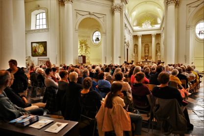 Réginald Moreels getuigt in bomvolle kerk